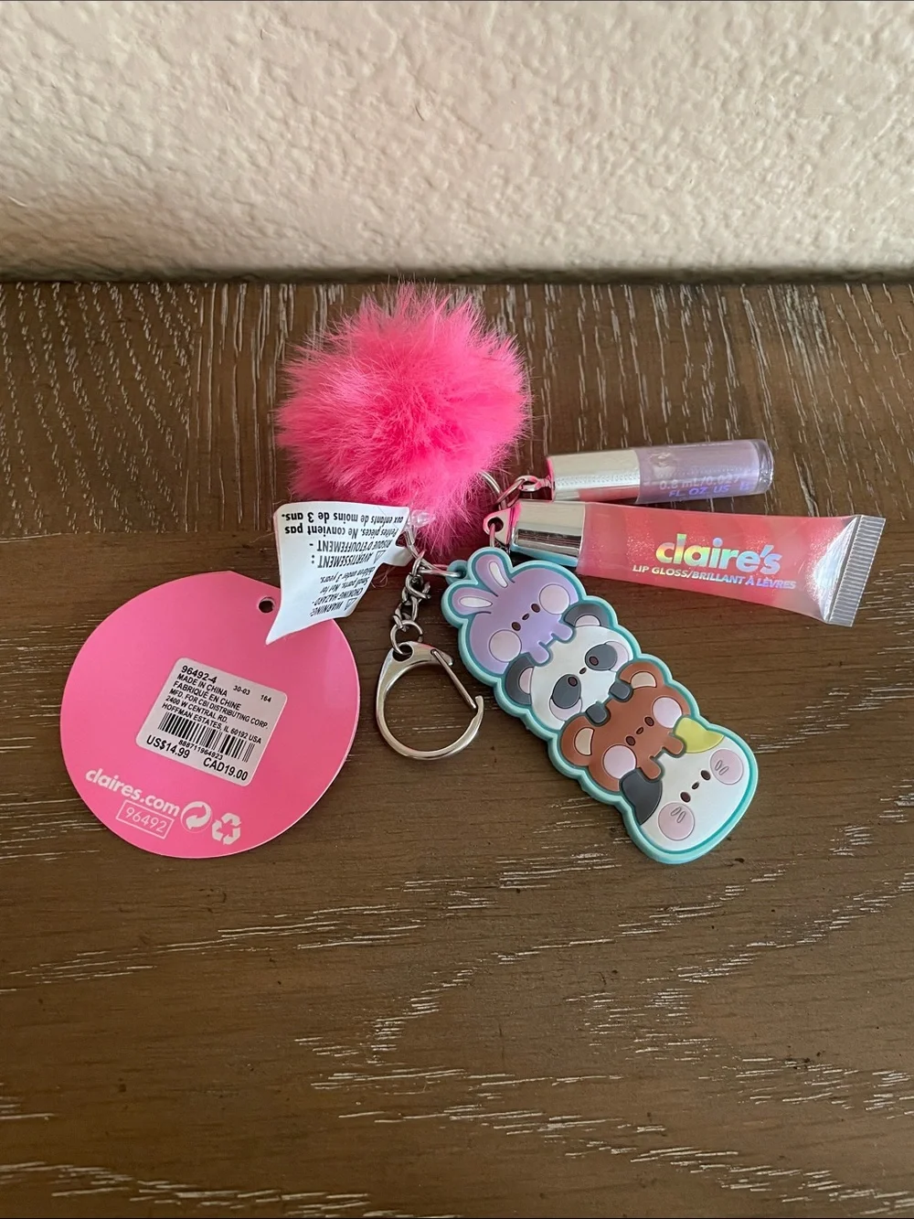💖 Pick three $15 - Claire’s Pom Keychain with Animal charm and Lip Gloss Set